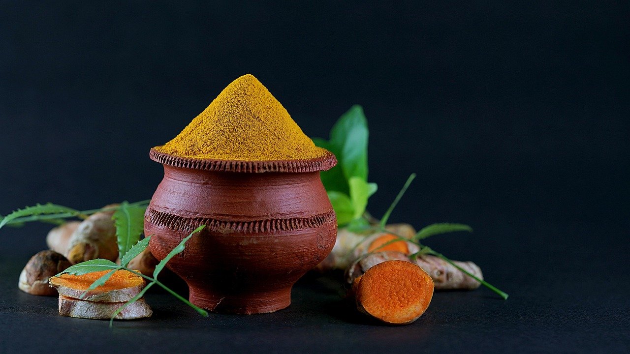 turmeric, neem, cup, spoon, undried turmeric, black background, wood spoon, full of turmeric, nature, leaf, dramatic