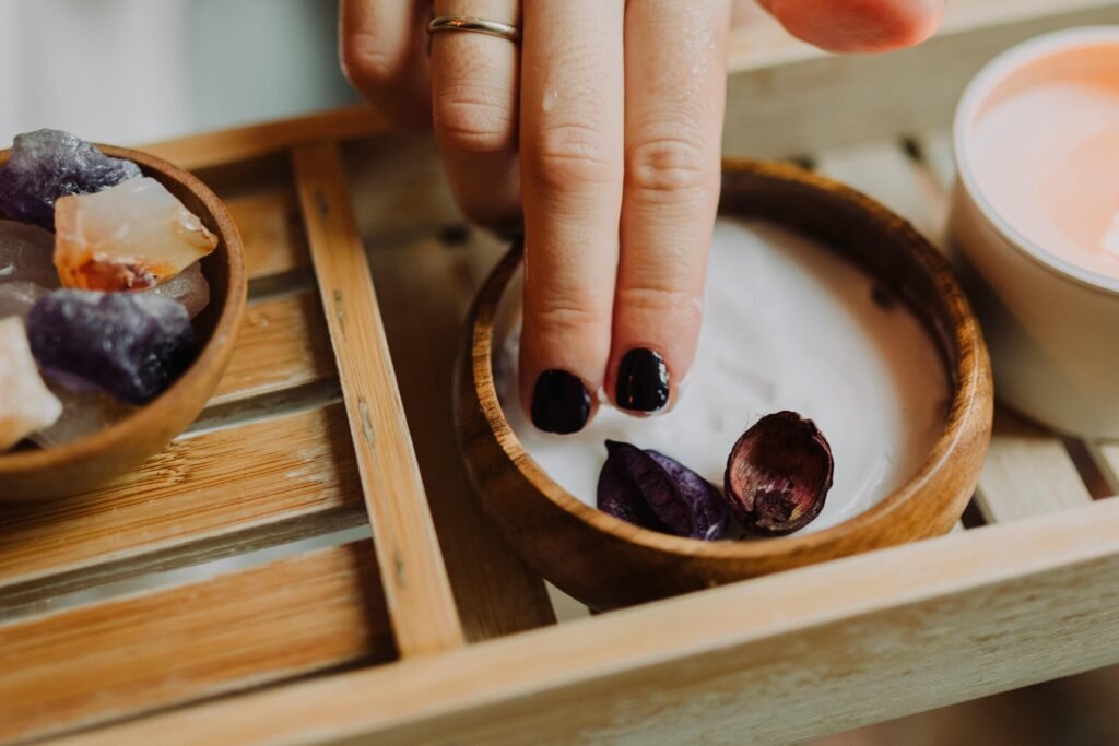 Indulge in a luxurious spa day with floral-infused hand treatments and natural crystals.
